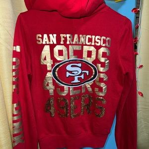 San Francisco 49ers zip up from pink